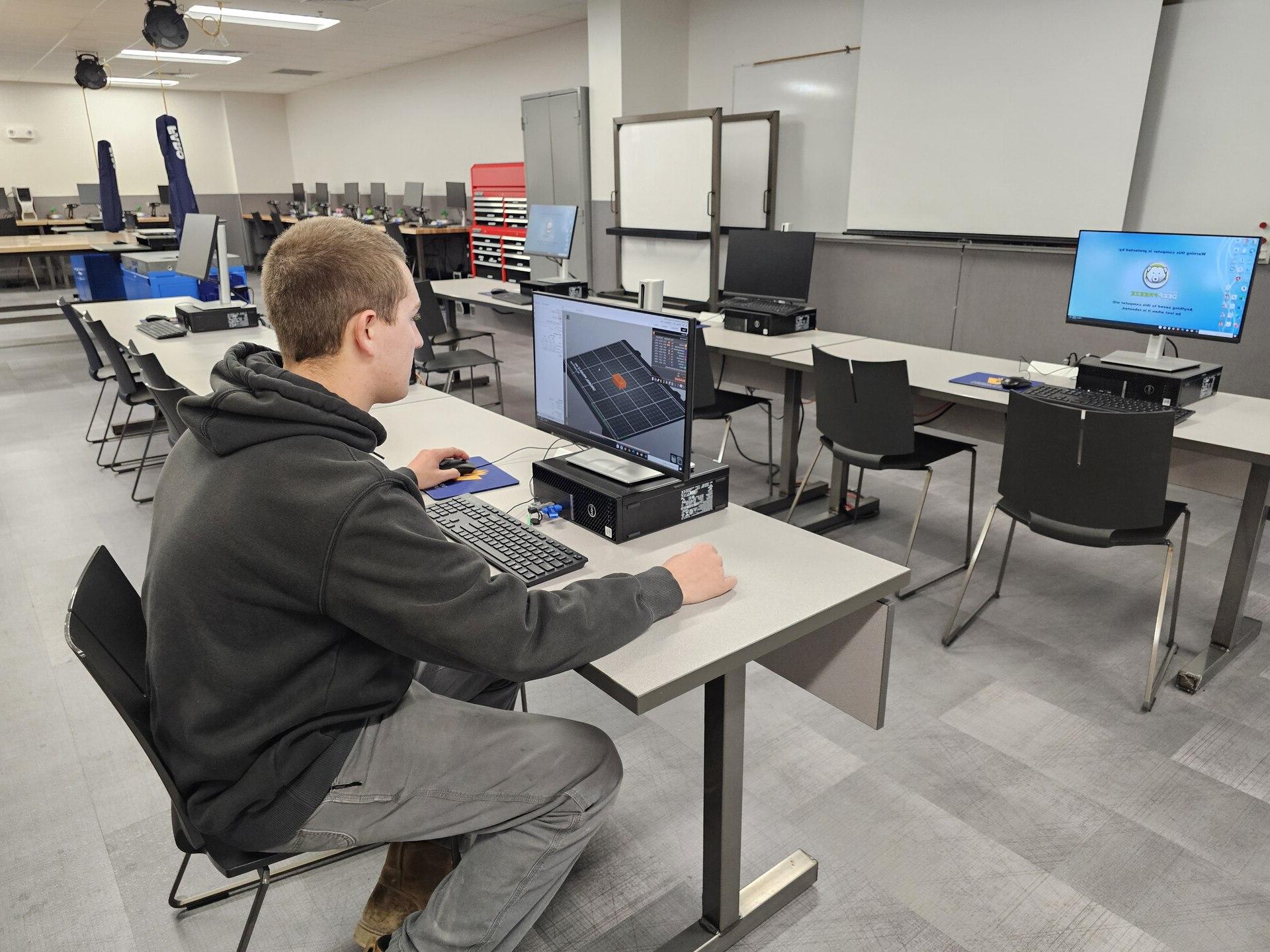 tech/product-design/Vincennes-University-CAD-Lab-Student-Using-CAD-Workstation